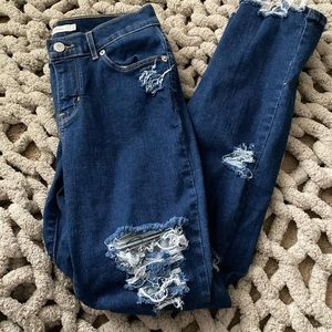 Dark slim straight ripped jeans